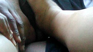 sexy girl gives footjob and makes him cum all over