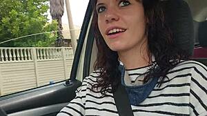 Skinny brunette masturbates pussy outside car in public