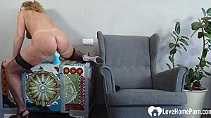 beautiful curly-haired milf fingers her pussy solo at home