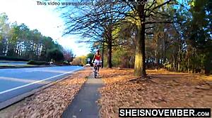 pretty ebony babe rides bike with upskirt nudity! tiny butt exposed!