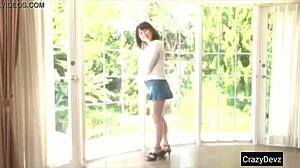 Beautiful Japanese woman with perfect figure showing off her large breasts