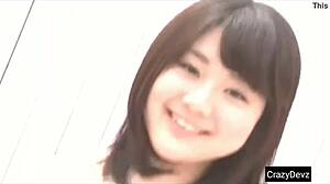 Beautiful Japanese woman with perfect figure showing off her large breasts