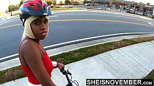 pretty ebony babe rides bike with upskirt nudity! tiny butt exposed!