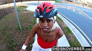 Cute ebony babe rides naked on her bike outdoors