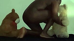 Enjoying a threesome with brown and caucasian furry toy bears during foreplay and massage