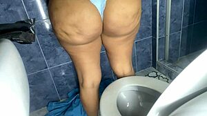 Beautiful black nurse in doctor’s office in homemade video