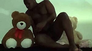Enjoying a threesome with brown and caucasian furry toy bears during foreplay and massage