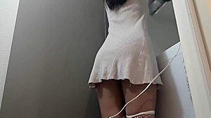 A beautiful Japanese amateur with big boobs and a nice ass has a dirty encounter in the changing room