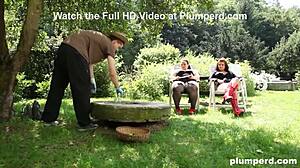 Two evil women in heels dominate a submissive gardener in a threesome