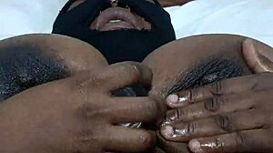 Look at this ebony beauty touching herself