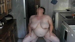 Cumshot on the pregnant cheating wife in the kitchen scene