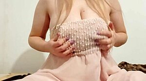 hottie in chic dress fondles big breasts outdoors