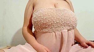 hottie in chic dress fondles big breasts outdoors