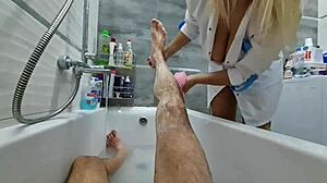 Stepmom ignores stepson's huge dick while washing him naked