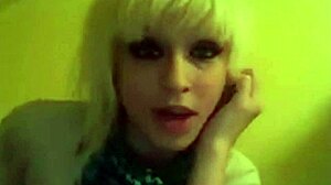Pretty girl playing video games while smoking cigarettes