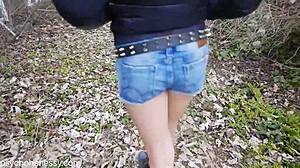 Woman Walks Outdoors Topless, Masturbating Pussy With Anal Toy