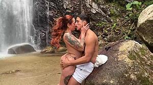 Redhead couple has outdoor sex and shakes their asses