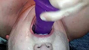 Ms. TL's throat skills with a dildo