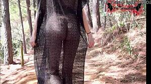 A gothic elf enjoys nature while pleasuring herself
