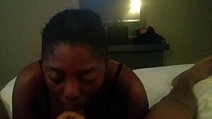 Bold ebony woman intensely sucking big black cock in hardcore action.