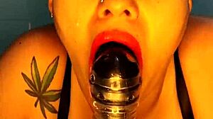 Blue intensely replaces his cock with a big dildo and swallows it whole.