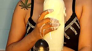 Blue intensely replaces his cock with a big dildo and swallows it whole.