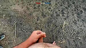 A brunette masturbates solo under a bridge in hentai style.