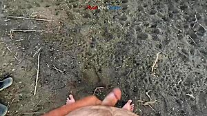 A brunette masturbates solo under a bridge in hentai style.