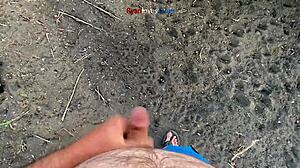 A brunette masturbates solo under a bridge in hentai style.