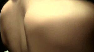 Two women engage in oral sex with a man in public