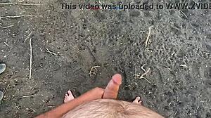 A brunette masturbates solo under a bridge in hentai style.