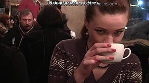 Two women engage in oral sex with a man in public