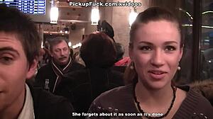 Two women engage in oral sex with a man in public