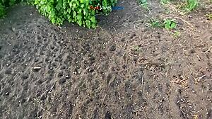 A brunette masturbates solo under a bridge in hentai style.