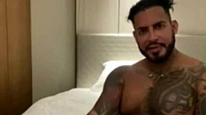 Tattooed Latino Viktor Rom masturbates his huge cock in homemade session