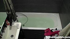 Stella fingers herself in solo tub time on hidden cam