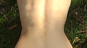 Beautiful woman with perfect body gets cum on her ass while outdoors