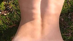 Beautiful woman with perfect body gets cum on her ass while outdoors