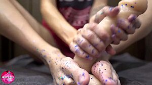 Beautiful woman gives a sensual footjob to a man with a rubber cock – foot fetish content