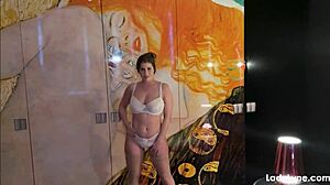 Lady Lyne showcases her curvy figure in a captivating display