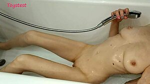 Young MILF Takes Shower While Boyfriend Films Her Tits.