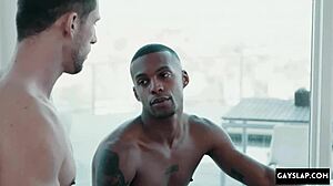 Big black cock dominates gay twink hard.