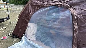 Young Asian college girl gives blow job and has sex in the woods during a camp and keeps quiet to avoid being scolded