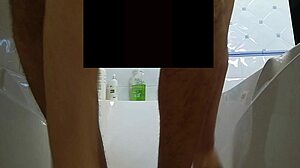 A young hairy gay guy takes a shower with a sperm wash
