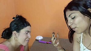 Lesbian step-aunt teases step-niece’s tits in homemade clip.