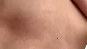 Brunette Babe Strips to Flash Natural Tits and Big Clit in Close-Up Show