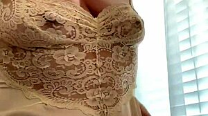 Brunette Babe Strips to Flash Natural Tits and Big Clit in Close-Up Show