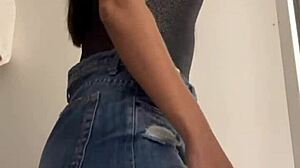 Sexy wife changes clothes in the shop dressing room