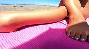 sexydea teases with juicy booty on beach.