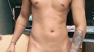 Pornstar masturbates to orgasm on rooftop terrace